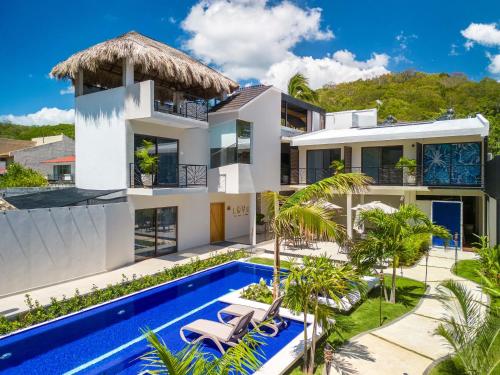 an image of a villa with a swimming pool at Casa Blú Huatulco in Santa Cruz Huatulco
