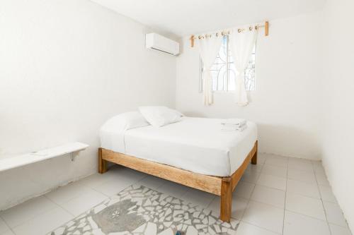 En eller flere senger på et rom på Casa Leon Rinconada