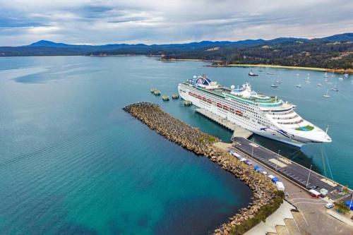 an aerial view of a cruise ship in a harbor at Totally Beachin! - walking distance to the beach in Eden