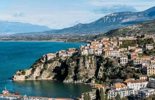 a town on a hill next to the water at Panoramic Apartments in Villa in Center "The Beach and The Cliff" 1 in Agropoli