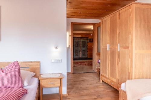 a living room with a couch and a table at Alte Bildhauerei in Aurach bei Kitzbuhel