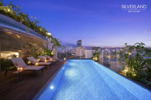 a swimming pool on the roof of a building at Silverland Bến Thành in Ho Chi Minh City