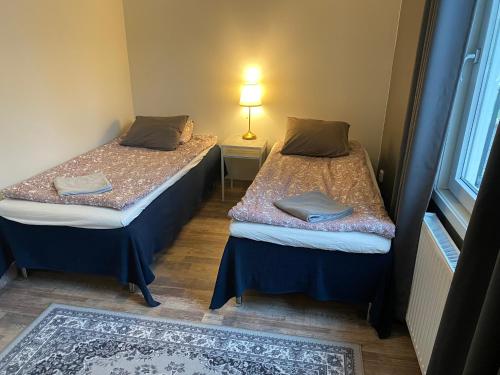 Postel nebo postele na pokoji v ubytování Apartments Norrtullsgatan 8