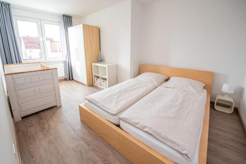 Postel nebo postele na pokoji v ubytování Haus Auszeit