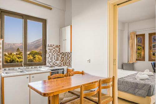 Ένα ή περισσότερα κρεβάτια σε δωμάτιο στο Paradise Hotel-Apartments 
