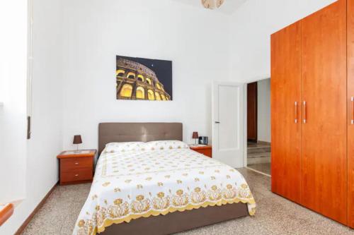 Tempat tidur dalam kamar di Felici’s apartment agli scavi di Ostia Antica