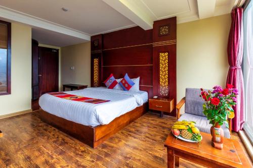 Ένα ή περισσότερα κρεβάτια σε δωμάτιο στο Sapa Vista Hotel
