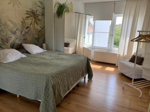 Katil atau katil-katil dalam bilik di Guesthouse Poppies , Free Parking