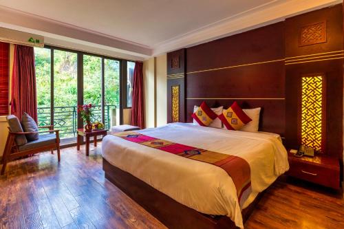 Ένα ή περισσότερα κρεβάτια σε δωμάτιο στο Sapa Vista Hotel