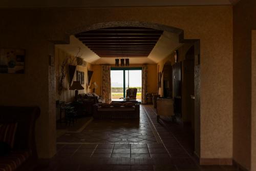 a hallway with a living room with a couch at Ras Sedr Royal Beach Villa at Sinaway Lagoon Hotel & Spa- Ras Sedr, Egypt in Ras Sedr