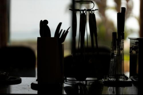 a group of utensils are sitting on a table at Ras Sedr Royal Beach Villa at Sinaway Lagoon Hotel & Spa- Ras Sedr, Egypt in Ras Sedr