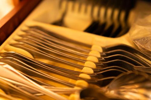 a pile of forks and spoons in a drawer at Ras Sedr Royal Beach Villa at Sinaway Lagoon Hotel & Spa- Ras Sedr, Egypt in Ras Sedr
