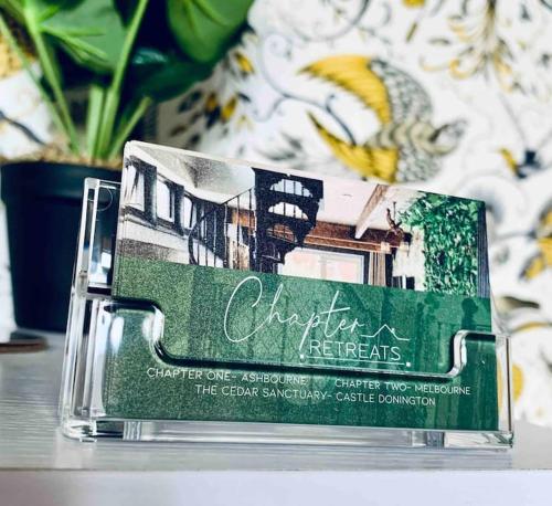 a glass container with a picture of a house at Chapter Two - Melbourne in Melbourne
