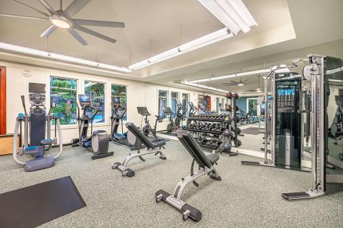 a gym with a lot of treadmills and machines at Ho Olei Residences - CoralTree Residence Collection in Wailea