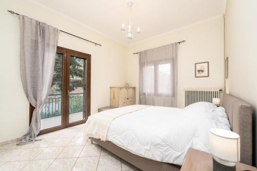 Ένα ή περισσότερα κρεβάτια σε δωμάτιο στο Clepsydra Mountain House