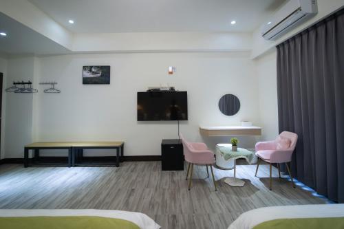 TV a/nebo společenská místnost v ubytování South of Penghu Homestay