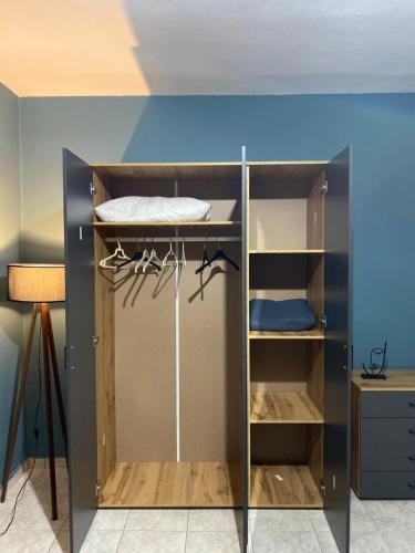 a room with a bunk bed and a closet at Cozy house in Xanthi