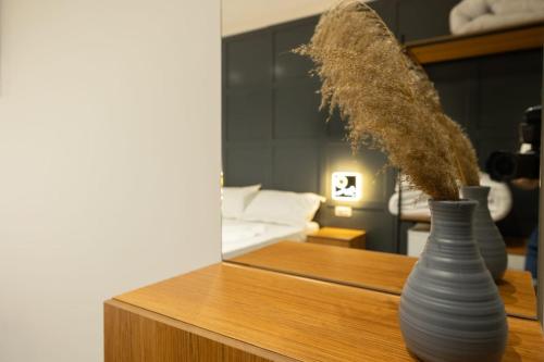 Postel nebo postele na pokoji v ubytování Aglon Twin's Hotel