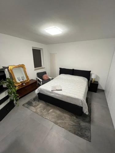 Ein Bett oder Betten in einem Zimmer der Unterkunft Appartamento nuovo e confortevole