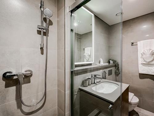 Koupelna v ubytování Trophy - Cozy Elegant Suites