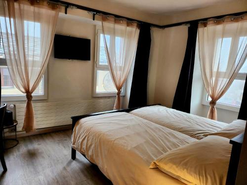 Postel nebo postele na pokoji v ubytování Auberge de l’Union