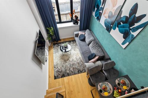 Ruang duduk di Tempus Te Premium Duo Lofts Tartu - private cinema, gym and terrace