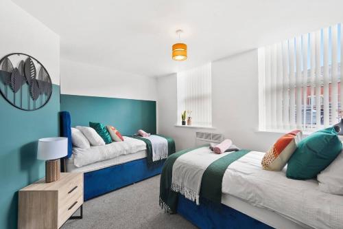 Voodi või voodid majutusasutuse Boutique Nottingham Abode - Sleeps 6 toas