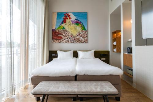 Кровать или кровати в номере Hotel Pontsteiger