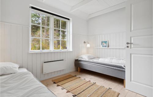 Postel nebo postele na pokoji v ubytování Nice Home In Knebel With Wifi