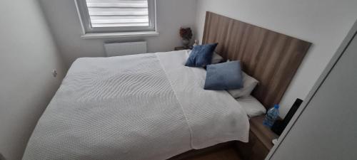 Vuode tai vuoteita majoituspaikassa Apartament Dworcowa 30A 14