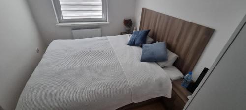Posteľ alebo postele v izbe v ubytovaní Apartament Dworcowa 30A 14