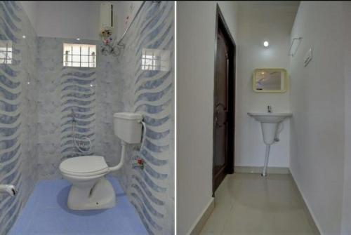 a bathroom with a toilet and a sink at Coorg Vacation Stay(KKR) in Madikeri