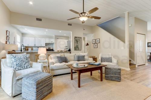 a living room with a couch and chairs and a table at 2505B W, 5th St condo in Fernandina Beach