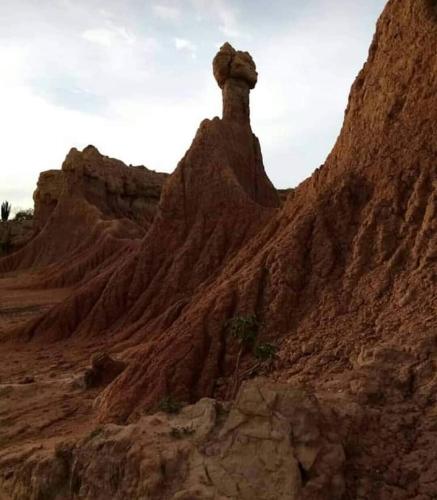 a rock formation in the middle of a desert at Hostal Makesa Tatacoa in Villavieja