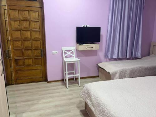 Postel nebo postele na pokoji v ubytování Surami Guesthouse