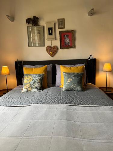 Postel nebo postele na pokoji v ubytování B&B De Kamer Hiernaast
