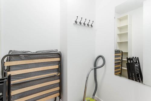 a room with a mirror and a radiator at Enjoy! Ursus in Warsaw