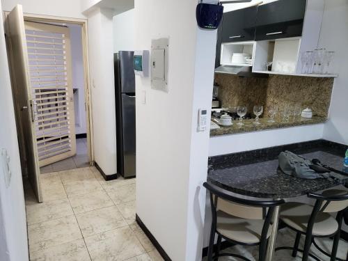 Majoituspaikan Apartamento los caobos keittiö tai keittotila