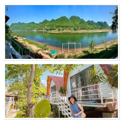 a woman standing in front of a house next to a lake at Areca Bungalow in Phong Nha