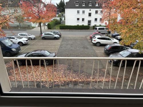 a view of a parking lot with parked cars at Central Service Apartment in Recklinghausen