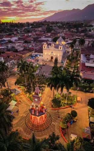 an aerial view of a city with a town at La Casa de Mamapán Hotel Colonial Ahuachapan in Ahuachapán