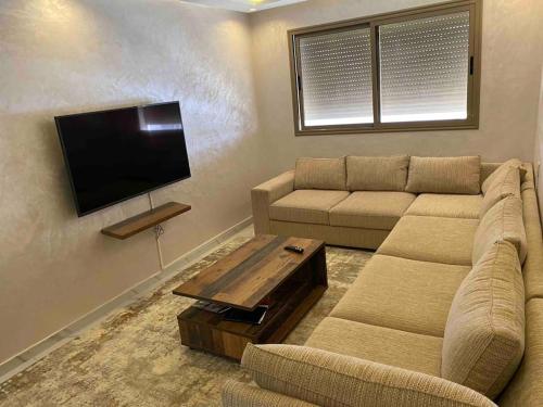 Et tv og/eller underholdning på Appartement sala al jadida