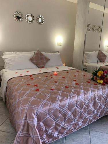 Ένα ή περισσότερα κρεβάτια σε δωμάτιο στο B&B Via del Sole