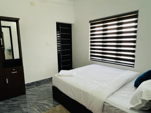 Cama o camas de una habitación en Hayat Residency - The Quarry Lake