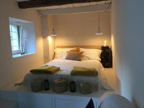 Posteľ alebo postele v izbe v ubytovaní B&B Valle Spluga Il Pertugio