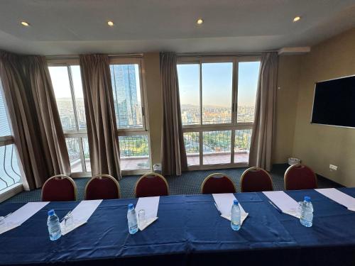 a meeting room with a table with water bottles on it at Padova Hotel in Beirut