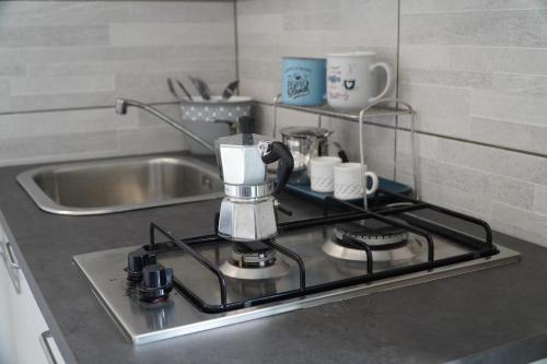 Cucina o angolo cottura di La Sabbia B&B