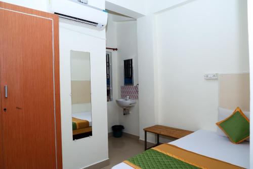 Katil atau katil-katil dalam bilik di Royal Green Accommodation Chennai Airport