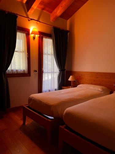 Cama o camas de una habitación en Agriturismo Busa dei Sbrase