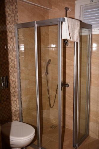 a shower in a bathroom with a toilet at The Marmaris Boutique Hotel in Marmaris